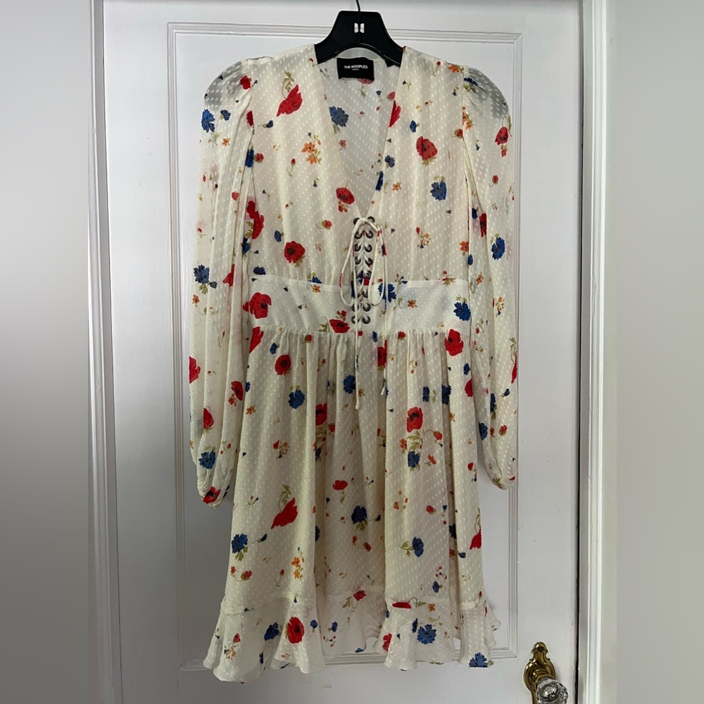 The Kooples white floral long sleeve dress with lace up detail. Size 2.